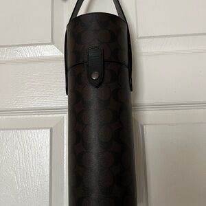 Coach Black and Brown Cylinder Bag